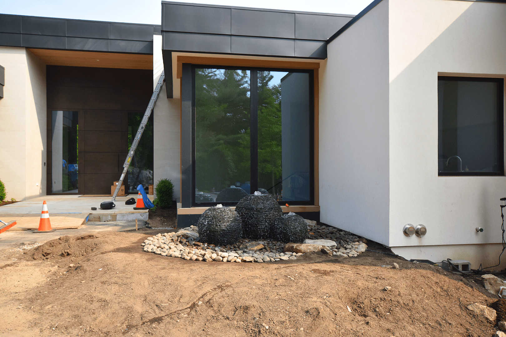 Three Aquascape Spheres Fountainscape at Contemporary Home Entrance
